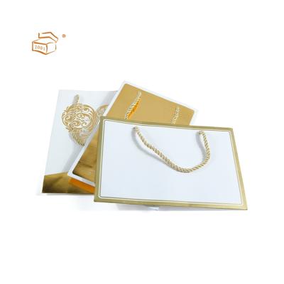 China Recycled Materials Modern Design Hot Custom Luxury Gift Shopping Paper Bag With Logo for sale