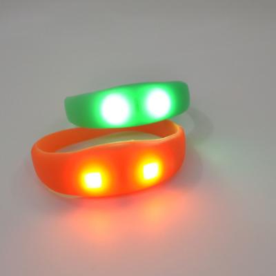 China Noise enabled; Custom LOGO decoration party party decoration glowing healthy flashing healthy activated lead silicone bracelet for sale