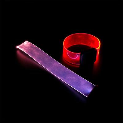 China ABS case+silicone bands+electric elements led flashing glowing color changing led wristband TPU glow magnet LED wristband for sale