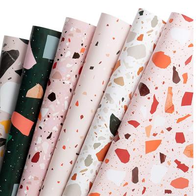 China Custom Wholesale Moisture Proof Christmas Flower Wrapping Paper Gift Wrapping Paper for sale