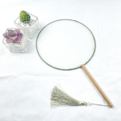 China China Promotional Gift Chinese Exquisite Round With Wooden Handle With Silk Tassel Hand Fan for sale