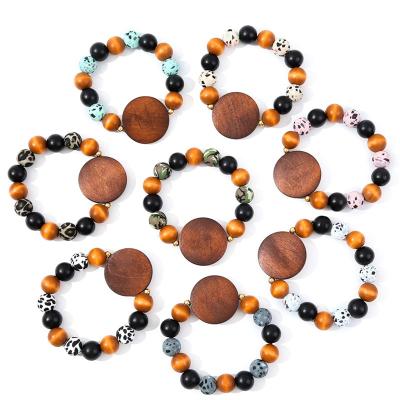 China Vintage Wood Beads Silicone Beads Bracelets For Women Blank Monogram Wood Disc Bracelet for sale