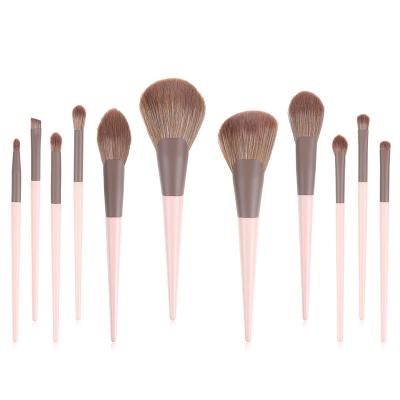 China Angular Blush Factory 11pcs Small Pudding Loose Powder Eyeshadow Brush Set Cosmetic Bags Makeup Brushes Without Logo for sale