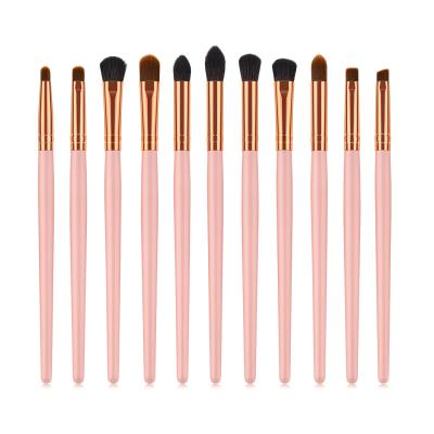 China Angular Blush 11pcs Eye Makeup Tool Kit Wooden Handle Rose Gold Makeup Brushes Eyebrow Brush Eyeshadow Brush for sale