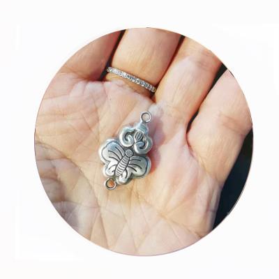 China Butterflies In Love With Flower Design Creative Pendant Loving Flowers 100% Solid 999 Silver Butterfly Cut Out Butterfly Pattern 100% Solid 999 Silver for sale