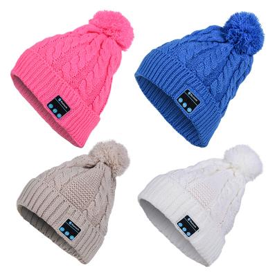 China Factory Sale Women Winter Fashion BT Music Character Knitted Beanie Hat With A Ball And Wireless BT Earphone For Outdoor for sale