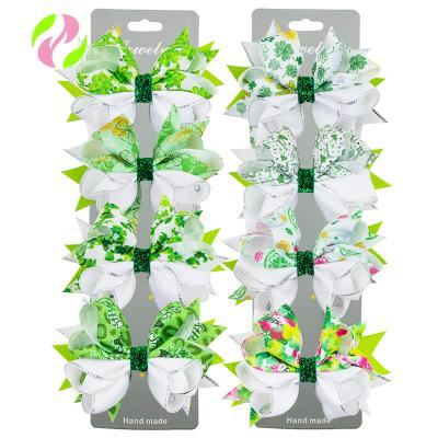 China Hot Selling Lovely Children's St. Patrick's Day Bow Knot Hair Clip Four Leaf Clover Platypus Bow Hairpin HC-391 for sale