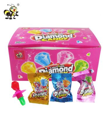 China Natural Natural Fruit Flavor Halal Lollipop Candy Lollipop Glow Diamond Ring Sweet Candy for sale