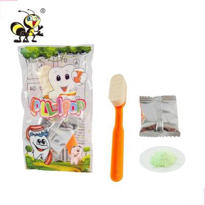 China Glucose Confectionery Toothbrush Shaped Toy Sour Powder Lollipop Hard Candy Candy for sale