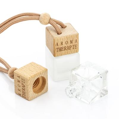 China 8ml Car Perfume Glass Bottle Cosmetic Empty Hanging Car Perfume Bottle Wooden Hanging Diffuser for sale