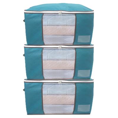 China New Quilt Sustainable Nonwoven Storage Bag Large Capacity Visible Covering Clothing Storage Bags With Card Slot for sale