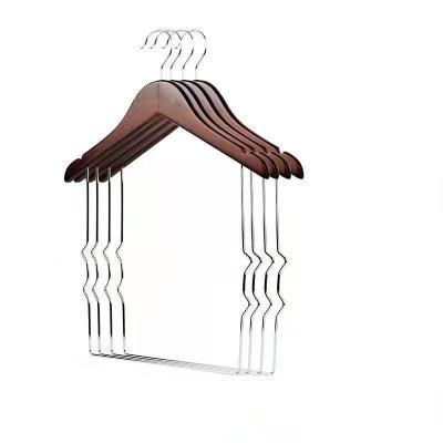 China Modern wholesale children's clothing store wooden hangers luxury metal traceless hangers for pants and clothes for sale