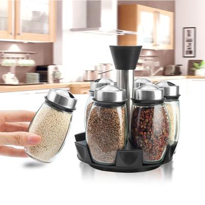 China Amazon Sustainable Hot Selling Rotary Stainless Steel Spice Jar Set Condiment Glass Jar/Bottle With Spice Rack for sale