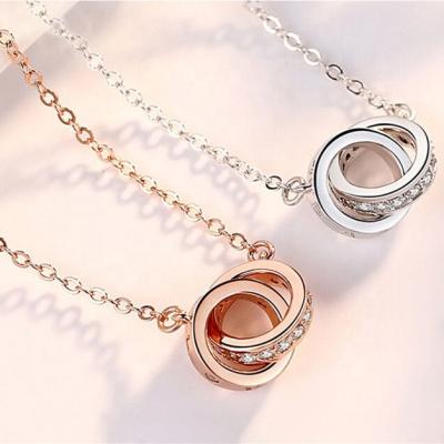 China Newest Romantic Crystal Pendant Gold Plated Necklace For Female Double Circle Entwined Ring Rose Gold Necklace for sale