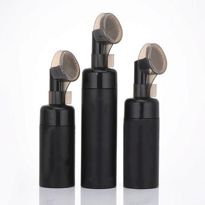 China 100ml 120ml 150ml 200ml Cosmetic Black Plastic Lotion Bottle Foaming Foaming Emulsion Face Wash Bottle With Brush for sale