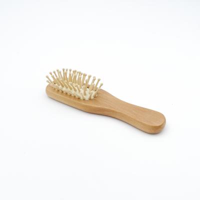 China Waterproof Custom 100% Natural Wooden Handle Cushion Massage Hair Brush Rubber Comb With Bamboo Pins for sale