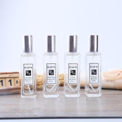 China Cosmetic Luxurious square glass clear glass perfume bottle 30ml with spray for sale