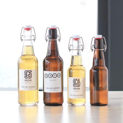 China Beverage Wholesale Home Brewing Amber 500ml Kombucha Beer Glass Bottles with Airtight Easy Wire Swing Top Caps for sale