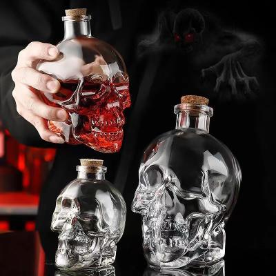 China Beverage Hot Sale Unique Skull glass bottle 750ml Premium Bar Vodka Glass Wine Whiskey Bottle for sale