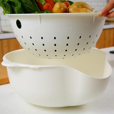 China Creative Stored Chamber 2 Tiers Vegetable And Fruit Drain Basket Plastic Double Sink Kitchen Sink Drain Basket Bowl for sale