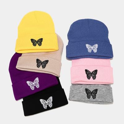 China COMMON Unisex Warm Embroidery Woolen Butterfly Solid Color Woman Winter Hat Knitted Hat for sale