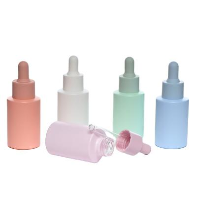 China 30ml Cosmetic Empty Color Glass Dropper Bottle Macarons Around Shoulder Flat Essential Oil Dropper Bottle for sale