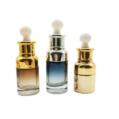 China Luxury Round 30mm Clear Cosmetic 20ml 30ml 50ml Ess Oil Serum Perfume Gel Glass Bottle With White Dropper Gold Silver Shoulder Bulb for sale