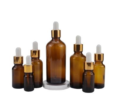 China Fancy 5ml/10ml/15ml/20ml/30ml/50ml/60ml/100ml/120ml Amber Glass Bottle For Essenctial Cosmetic Oil Cosmetic Packaging for sale