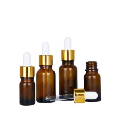 China Drop Applicator Bottle 50ml Brown Essential Oil Scale 30ml Brown Spot Cosmetic Goods Small Glass Cosmetic Bottle for sale