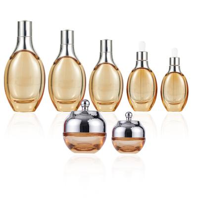 China New Rose Gold Glass Bottles Cosmetic Luxury Packaging For Cosmetics 150ML 120ML 100ML 50ML 30ML Serum Bottles for sale