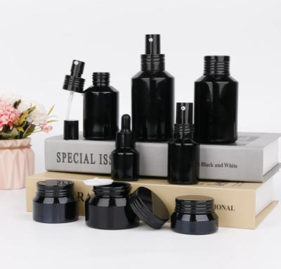 China Low Moq Cosmetic Custom Set 120ml 50ml 40ml 30g Skin Care Bottle For Lotion Toner Cream Oil Cosmetic Black Dropper Bottles And Jars Set for sale