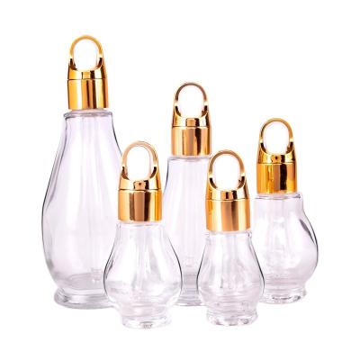 China Glass Dropper Bottle Skin Care Oil Dropper Bottle Essential Oil Cosmetic White Clear Essence Glass Dropper Bottle for sale