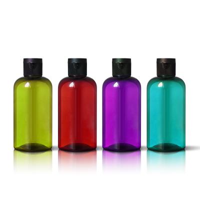 China Personal Care Wholesale Boston PET Bottle Mini 4 Ounce Round Amber Lotion Shampoo Bottles for sale