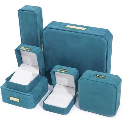 China Peacock Blue Soft Velvet Jewelry Box Organizer Custom Jewelry Box Sets Packaging for sale