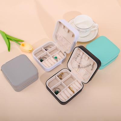 China Floating Effect PU Leather Jewelry Box , Zipper Travel Jewellery Case Multi Function for sale