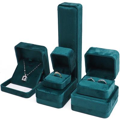 China Dark Green Elegant Sleek Velvet Jewellery Box Packaging Case For Luxury Storage for sale