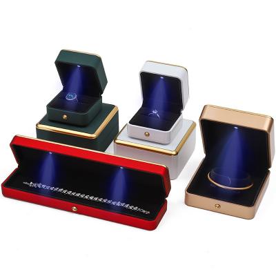 China Customized Gold Trim LED Jewelry Box Organizer for Bracelet Necklace Earrings Ring for sale