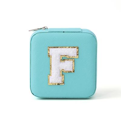 China Custom Portable Small Leather Sky Blue Jewelry Organizer Travel Case for sale