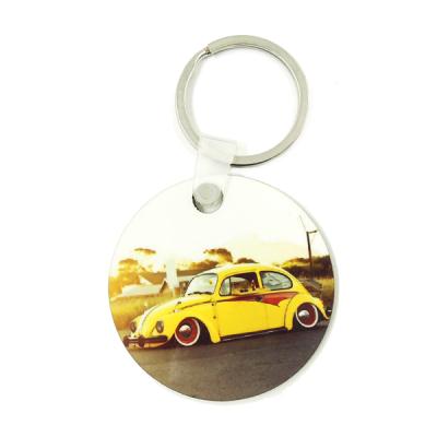 China Promotion Gift Sublimation MDF Key Chain Round Different Shapes Hardboard Key Ring With Footprint Photo DIY Gift for sale