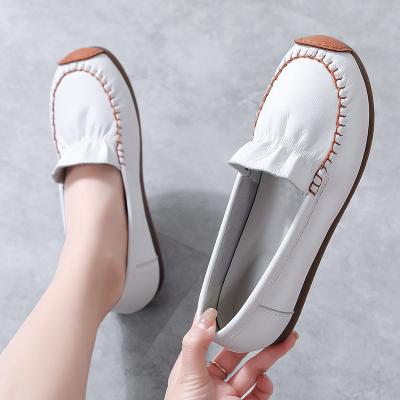 China Fashion Trend Size 35-41,087 Hollowed-out Classic Hand Stitched Tsutsu Mum Lace-up Flat-soled Slip-on Shoe for sale