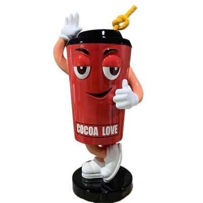 China Professional Custom Carving Tea Milk Coffee Shop Door Beauty Chen Resin Mug Europe Chain Store FRP Facade Cartoon Cold Cup for sale