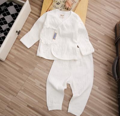 China Newest Solid Color Handmade Newborn Unisex Toddler Pajamas 3M 6M Newest Pajamas Set for sale