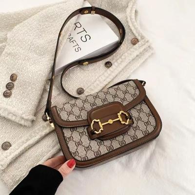 China Guangzhou 2023 New Niche Women's Armpit Women's Simple Luxury All-in-one Shoulder Bag Printed Cross - Body Bag for sale