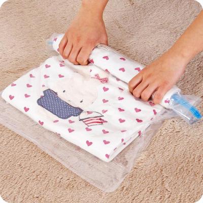 China Sustainable Reusable 12-Piece Hand Laundry Travel Vacuum Storage Sack Compression Sack Roll Up Space Bag for sale