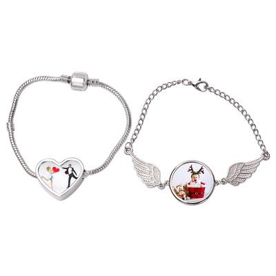 China Romantic Sublimation Alloy Metal Bangle Blank Charm with Heart and Angle Wings for sale