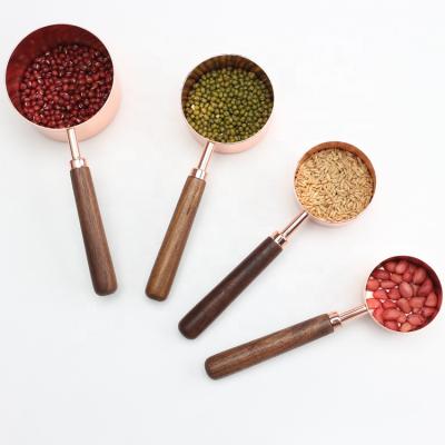 China Stocked 4pcs Stainless Steel Wooden Handle Rose Gold Measuring Tools Measuring Cups Set for sale