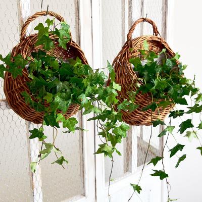 China Wicker Creative Handmade Gift Wicker Storage Basket Flower Hanging Weaving Plant for sale