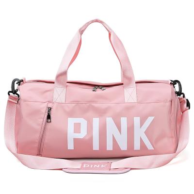 China Large Capacity Sports Travel Bag Pink Sport Gym Duffel Bag With Shoe Compartment for sale