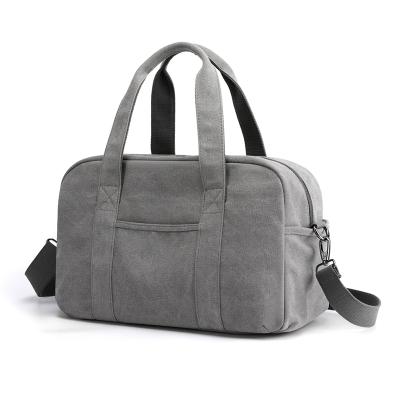 China Overnight Travel Men Women Canvas Large Capacity Weekend Travel Handbag Duffel Bag for sale