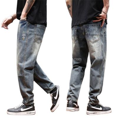 China Men's Breathable Jeans 2022 New High Street Hole Trend Loose Straight Men's Long Pants for sale